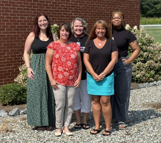 Madison County High School counselors standing outside the high school